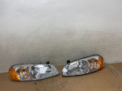 2001 to 2002 Chrysler Sebring Left+Right Side Headlights Z1055 DW0