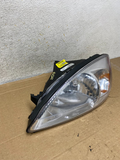 2000 to 2007 Ford Taurus Left Driver LH Side Halogen Headlight TYC AH8257 DW2