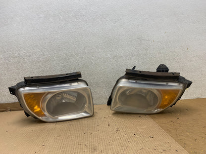 2003 to 2006 Honda Element Left+Right Side Headlights U2699 DW0