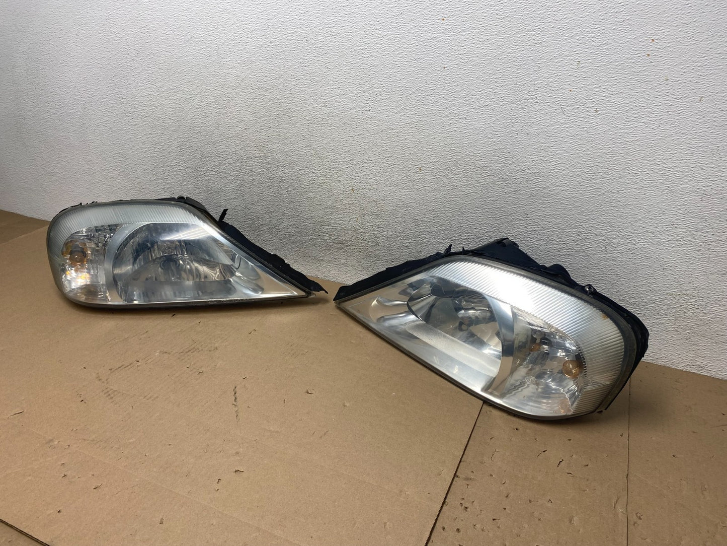 2000 to 2005 Mercury Sable Left+Right Side Halogen Headlights AG5739 DW1