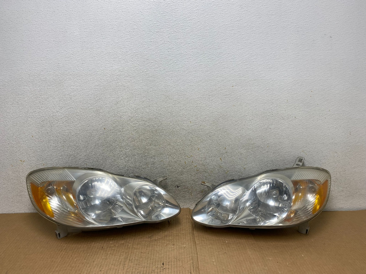 2003 to 2004 Toyota Corolla Left+Right Side Set Headlights AI6514 DW0