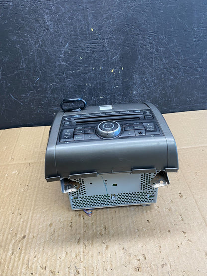 2010-2012 Nissan Sentra Center Dash Radio Bezel Panel Cubby Storage AC9610 DG3