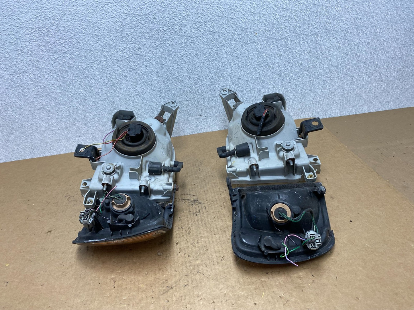 1999-2004 Nissan Pathfinder Left+Right Side Set Halogen Headlights Oem AC3302 DW10