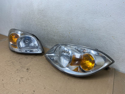 2005 - 2010 Chevrolet Cobalt Sedan Left+Right Headlights AI0959 DW1