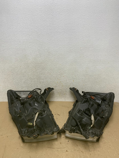 2004 to 2007 Nissan Armada Left+Right Side Set Headlights AH6884 DW11