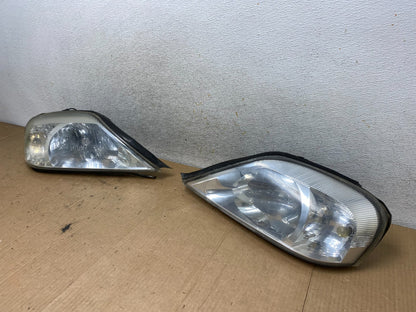 2000 to 2005 Mercury Sable Left+Right Side Halogen Headlights AI8874 DW1