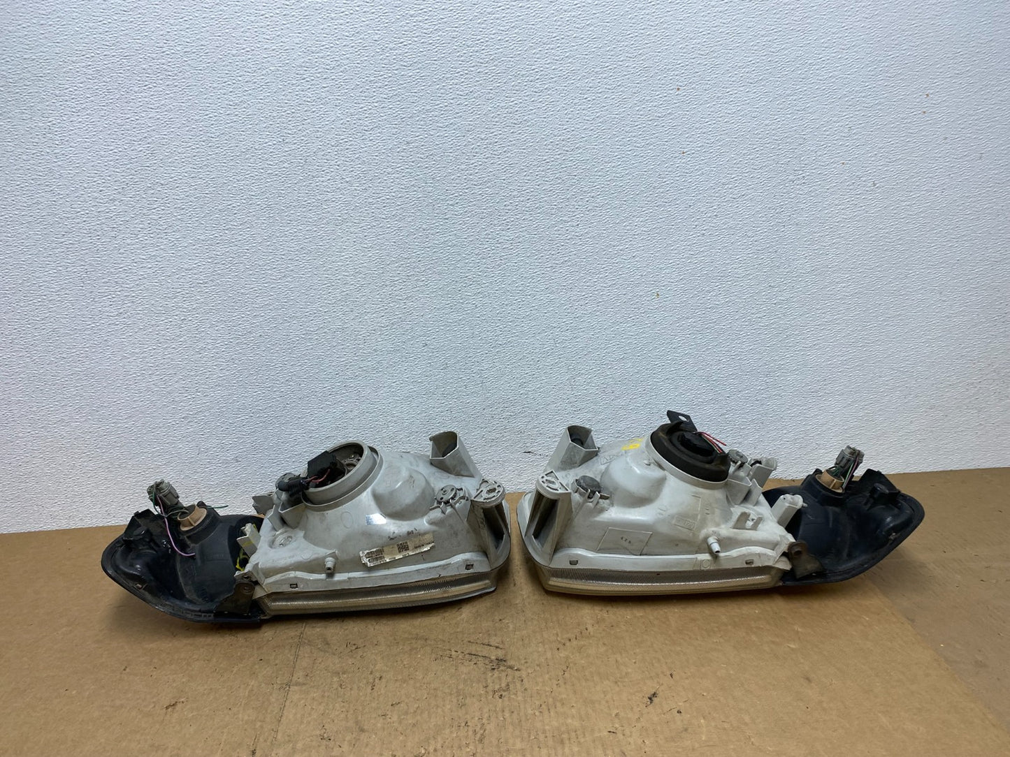 1999-2004 Nissan Pathfinder Left+Right Side Set Halogen Headlights Oem AC3325 DW10