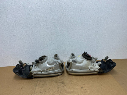 1999-2004 Nissan Pathfinder Left+Right Side Set Halogen Headlights Oem AC3325 DW10