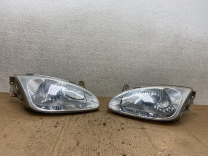 1999 2000 Hyundai Elantra Left+Right Side Set Halogen Headlights AA8542 DG0