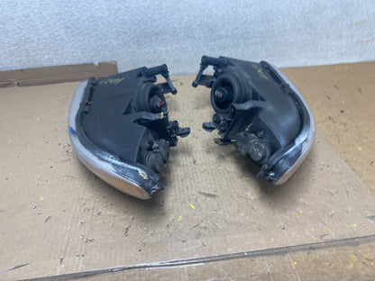 1996-2000 Chrysler Sebring Left+Right Side Halogen Headlights U2411 DW8