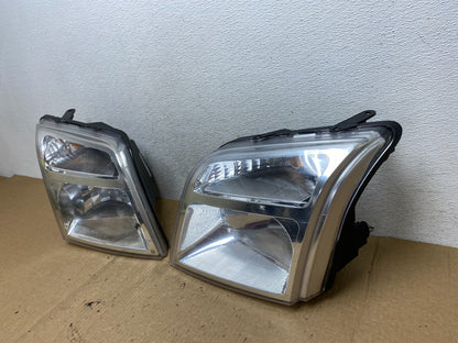 2010 to 2013 Ford Transit Connect Left+Right Side Headlights AF9775 DW1