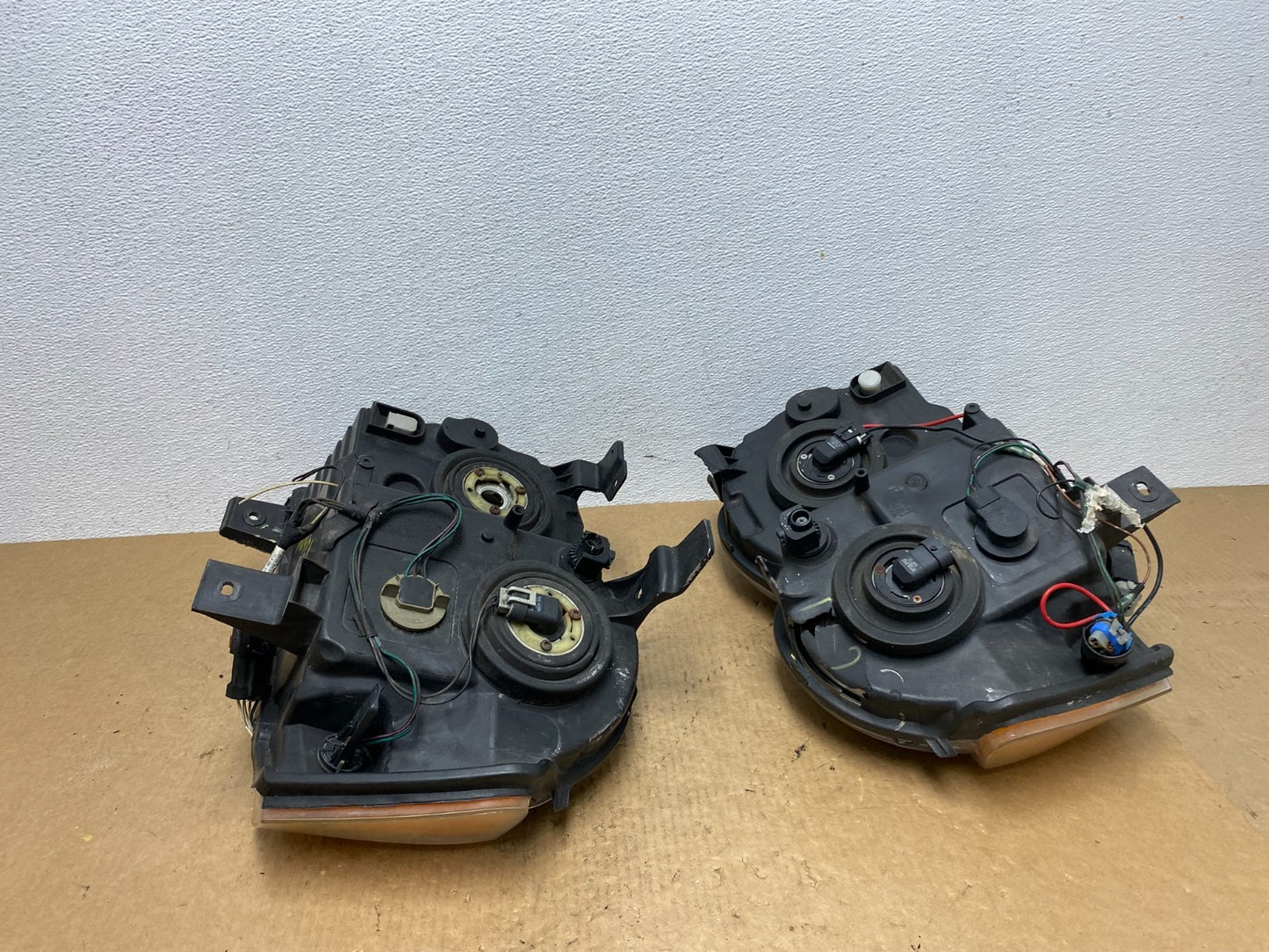 2009-2010 Jeep Grand Cherokee Left+Right Set Halogen Headlights AC3422 DW16