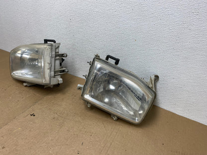 1999-2004 Nissan Pathfinder Left+Right Side Set Halogen Headlights AC5823 DW1