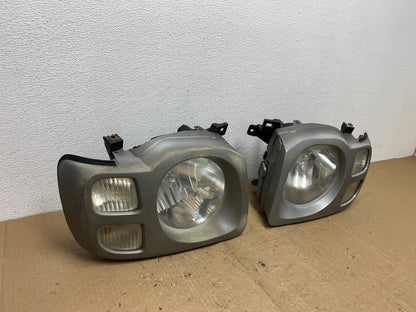 2002 2003 2004 Nissan Xterra Left+Right Side Headlights AC6020 DW2