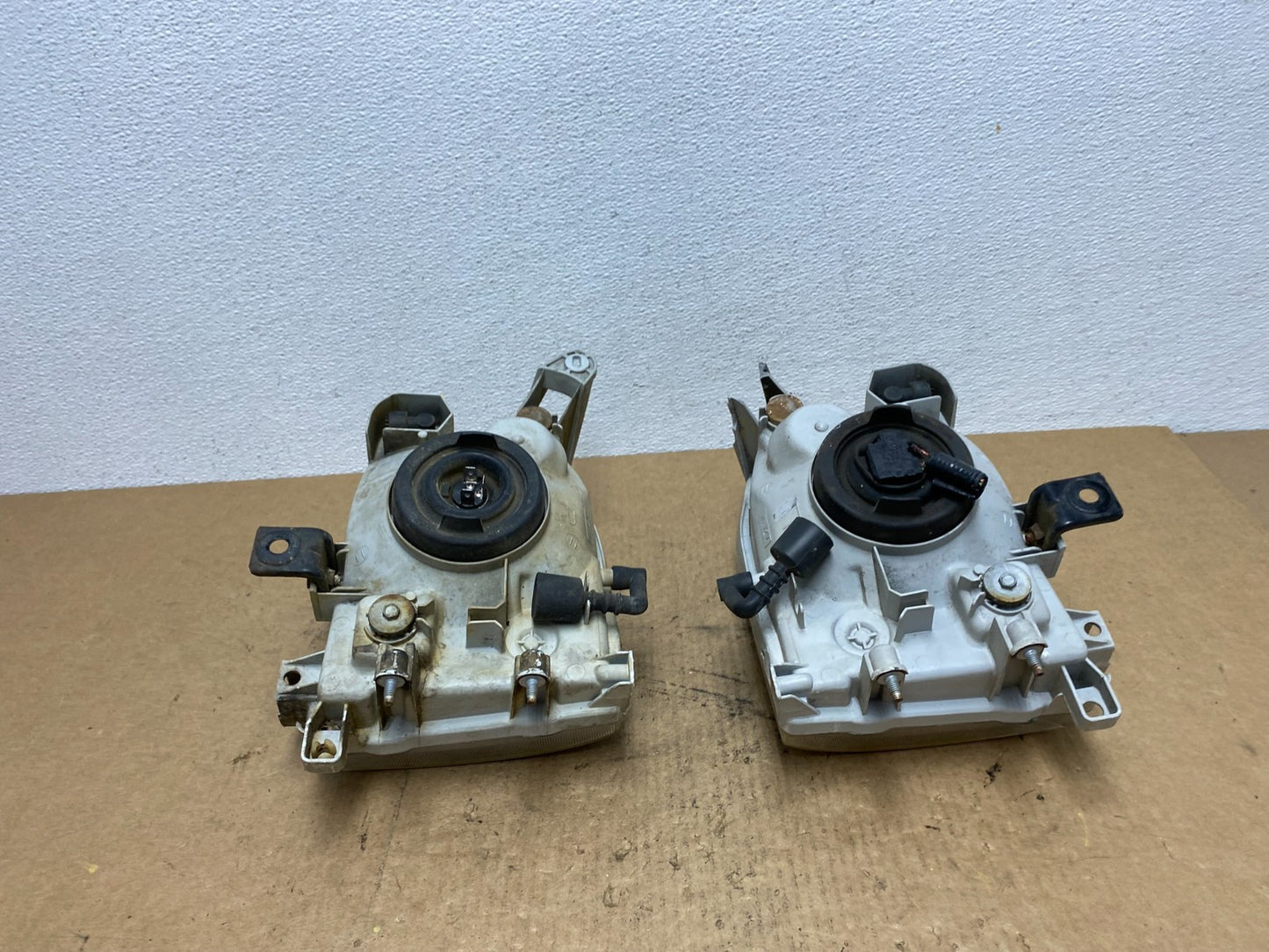 1999-2004 Nissan Pathfinder Left+Right Side Set Halogen Headlights Oem AC3402 DW10