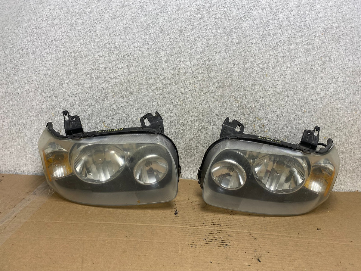 2005 - 2007 Ford Escape Headlights Left+Right Halogen AH4040 DW0