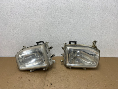 1999-2004 Nissan Pathfinder Left+Right Side Set Halogen Headlights AC6011 DW0