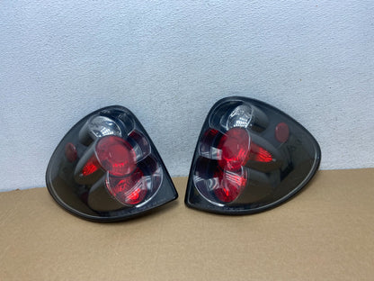 2001 to 2007 Dodge Grand Caravan Left+Right Set Side Black Tail Lights AF7266 DG0