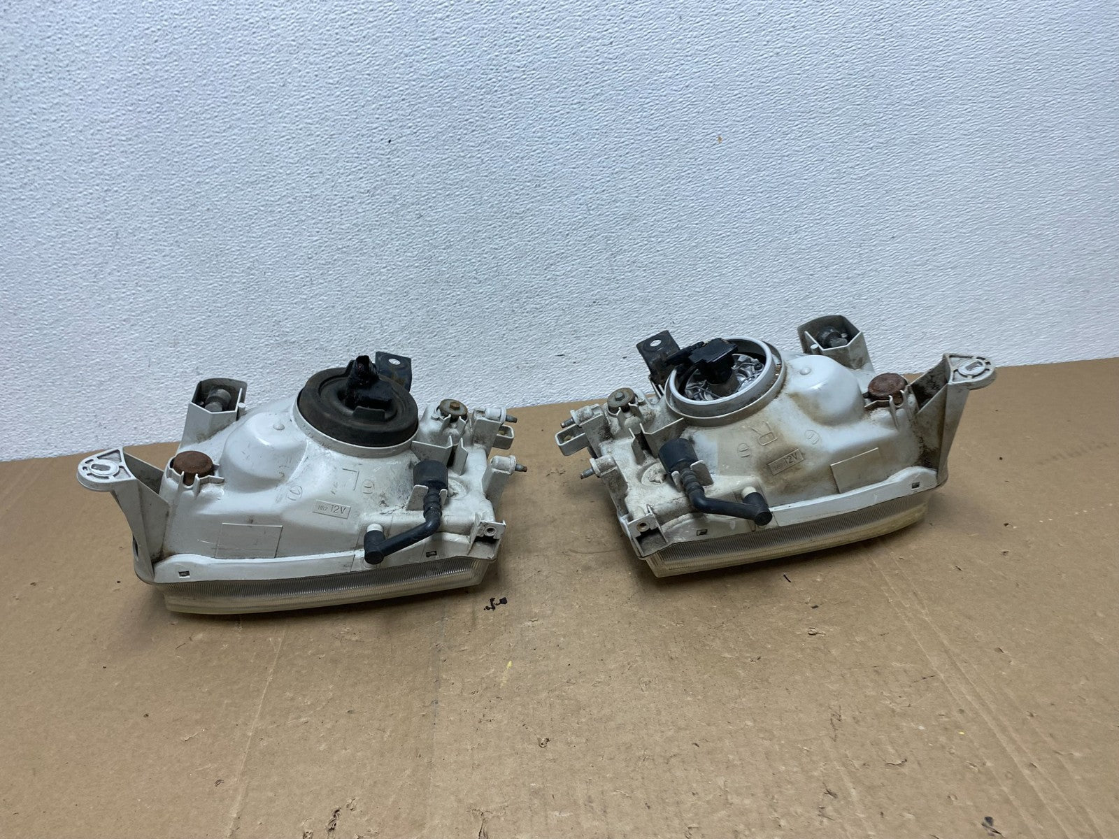 1999-2004 Nissan Pathfinder Left+Right Side Set Halogen Headlights AC5823 DW6