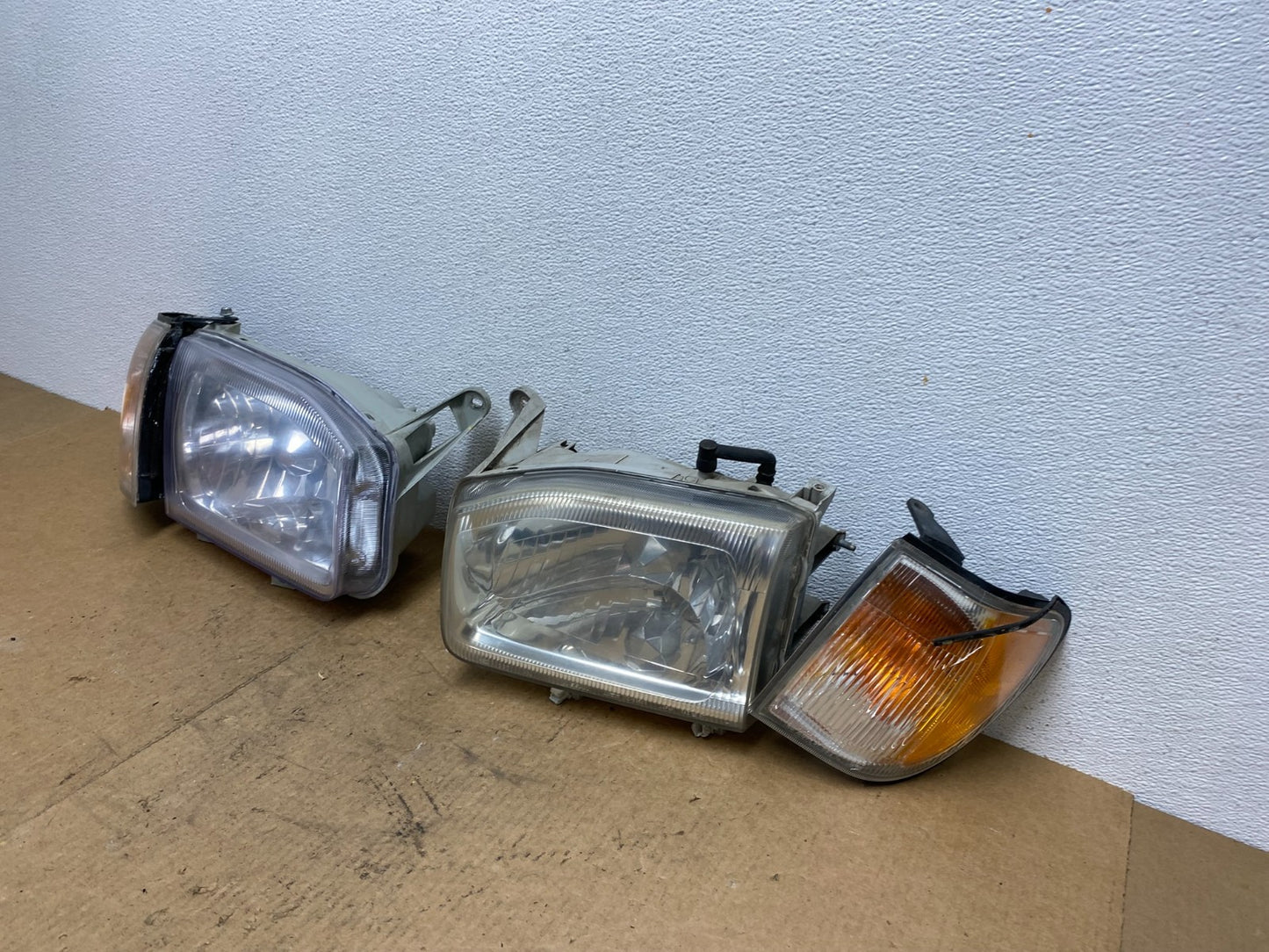 1999-2004 Nissan Pathfinder Left+Right Side Set Halogen Headlights AC3441 DW1