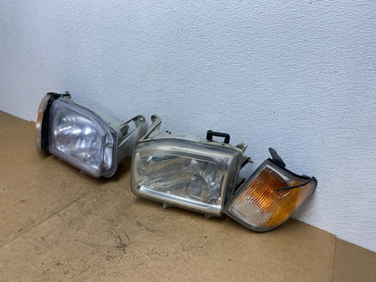 1999-2004 Nissan Pathfinder Left+Right Side Set Halogen Headlights AC3441 DW1
