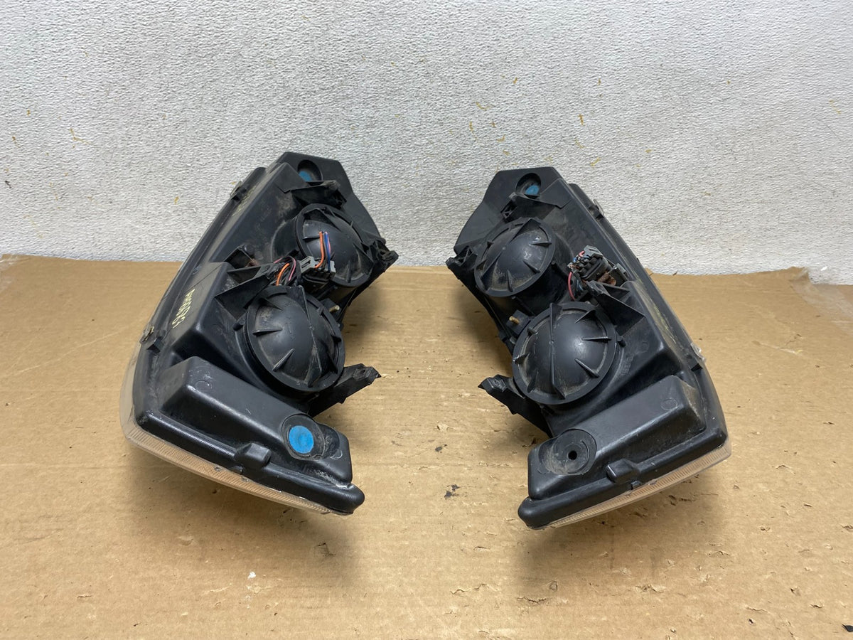 2003 to 2007 Saturn Ion Halogen Headlights Left+Right Side AH8883 DW10