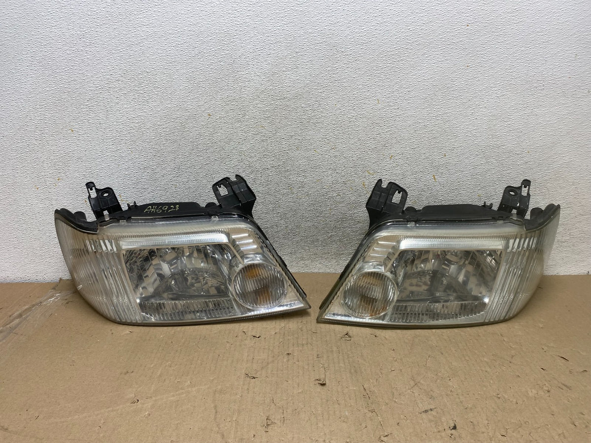 2005 to 2007 Mercury Mariner Left+Right Side Halogen Headlights AH6923 DW0