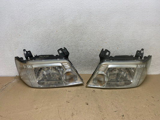 2005 to 2007 Mercury Mariner Left+Right Side Halogen Headlights AH6923 DW0