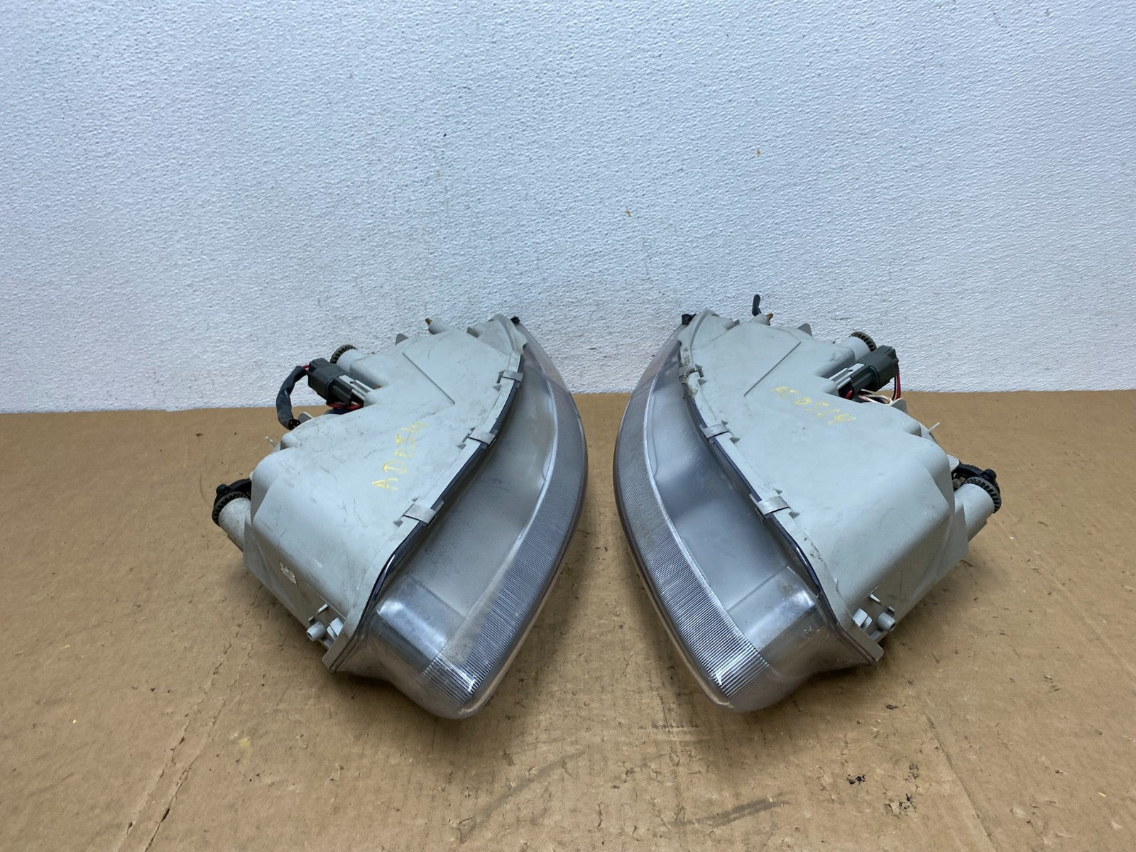 1995 to 1996 Chrysler Sebring Coupe Left+Right Side Headlights AD0514 DW8