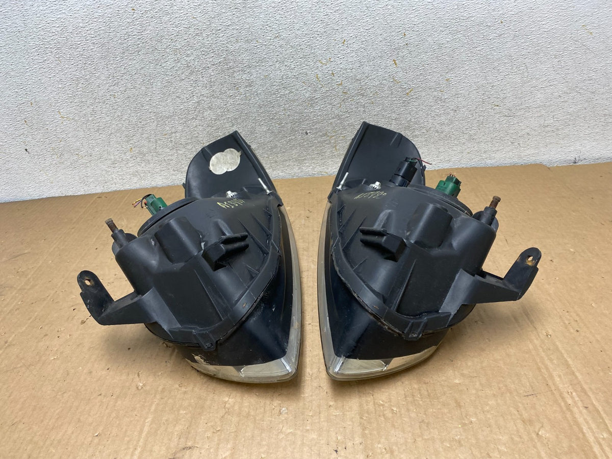 2004 - 2006 Nissan Sentra Halogen Left+Right Headlights AI8983 DW10