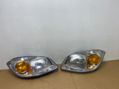 2005 - 2010 Chevrolet Cobalt Sedan Left+Right Set Headlights AC7552 DW0