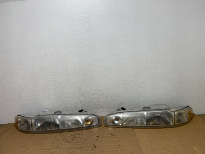 1998 to 2002 Oldsmobile Intrigue Left+Right Side Halogen Headlights AD4373 DG0