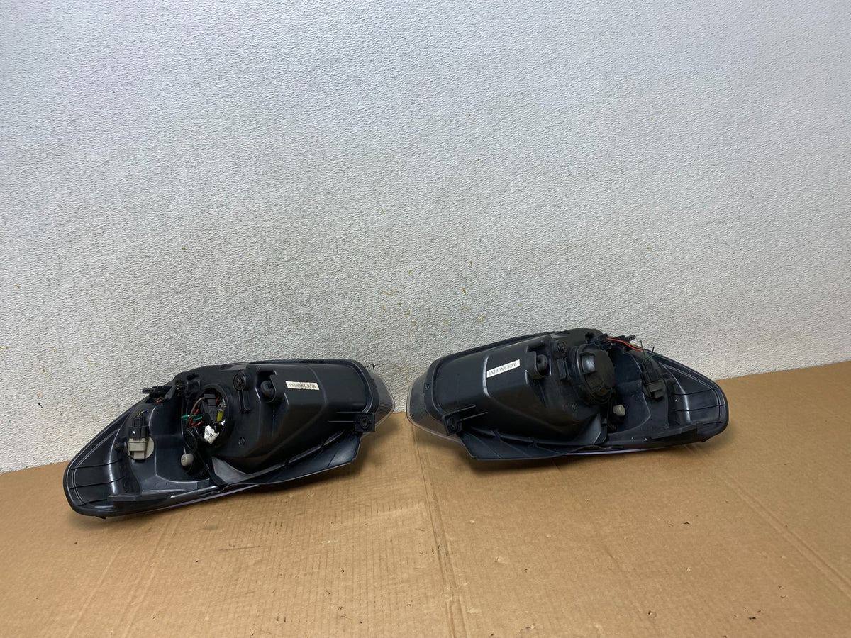 2006 to 2011 Hyundai Accent Sedan Left+Right Halogen Headlights AI3815 DW7