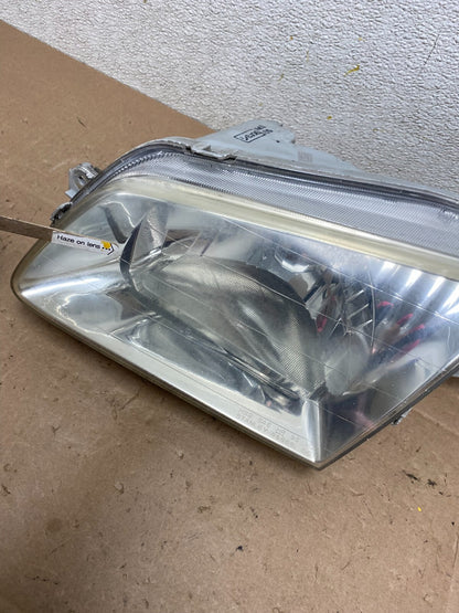 1999 to 2000 Mazda Protege Left Driver LH Side Headlight OEM M3848 DG3