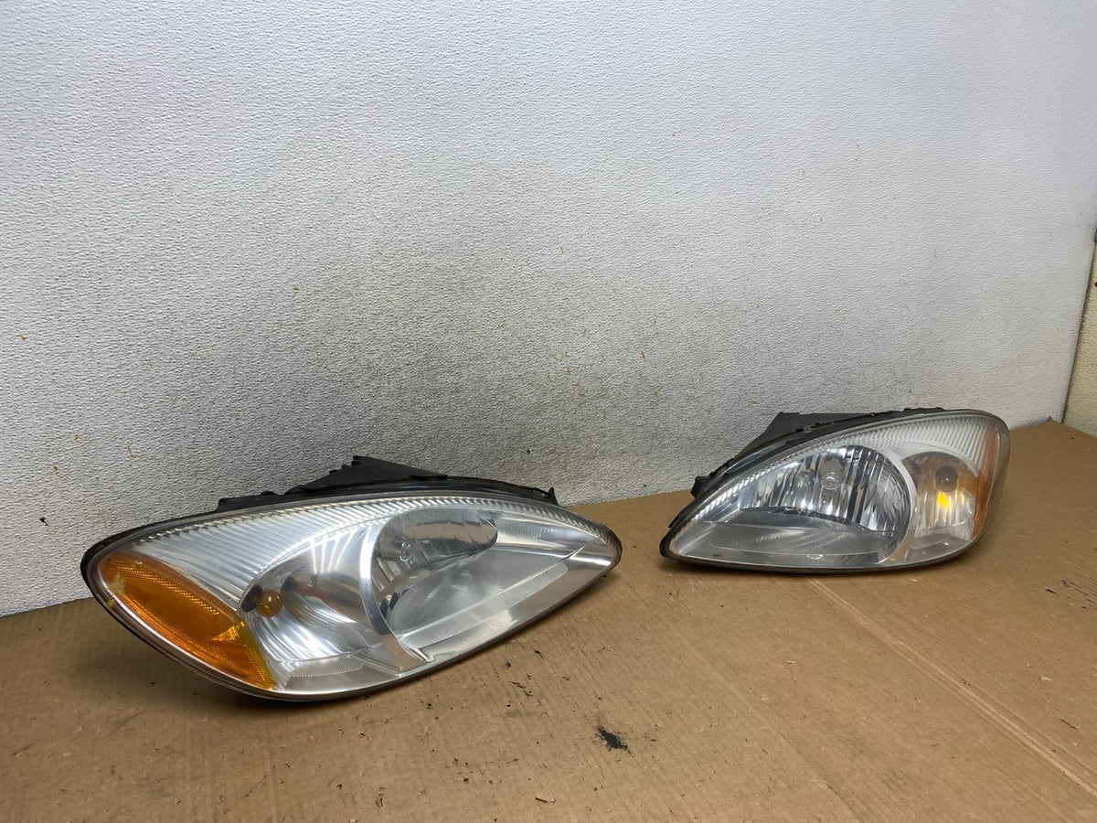 2000 to 2007 Ford Taurus Left+Right Side Halogen Headlights AI8873 DW2