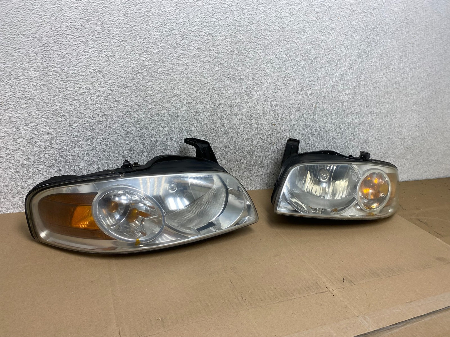 2004 - 2006 Nissan Sentra Halogen Left+Right Headlights AE6630 DW2