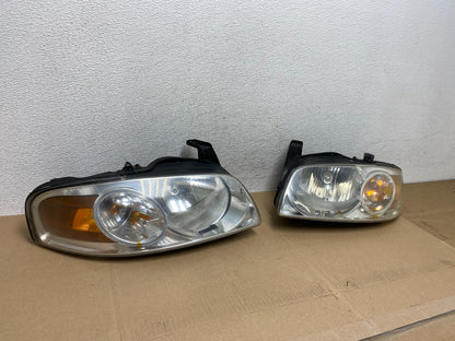 2004 - 2006 Nissan Sentra Halogen Left+Right Headlights AE6630 DW2
