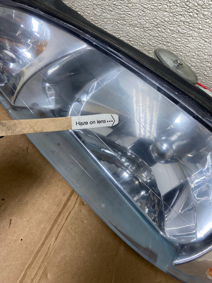 1998 to 2003 Ford Escort Left+Right Set Halogen Headlight Aftermarket AA1630 DG4