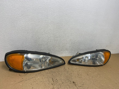 1999 to 2005 Pontiac Grand Am Left+Right Set Headlights AG1428 DW2