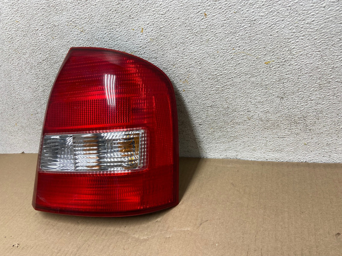 1999 to 2003 Mazda Protege Right Passenger RH Side Tail Light AH4360 LK2