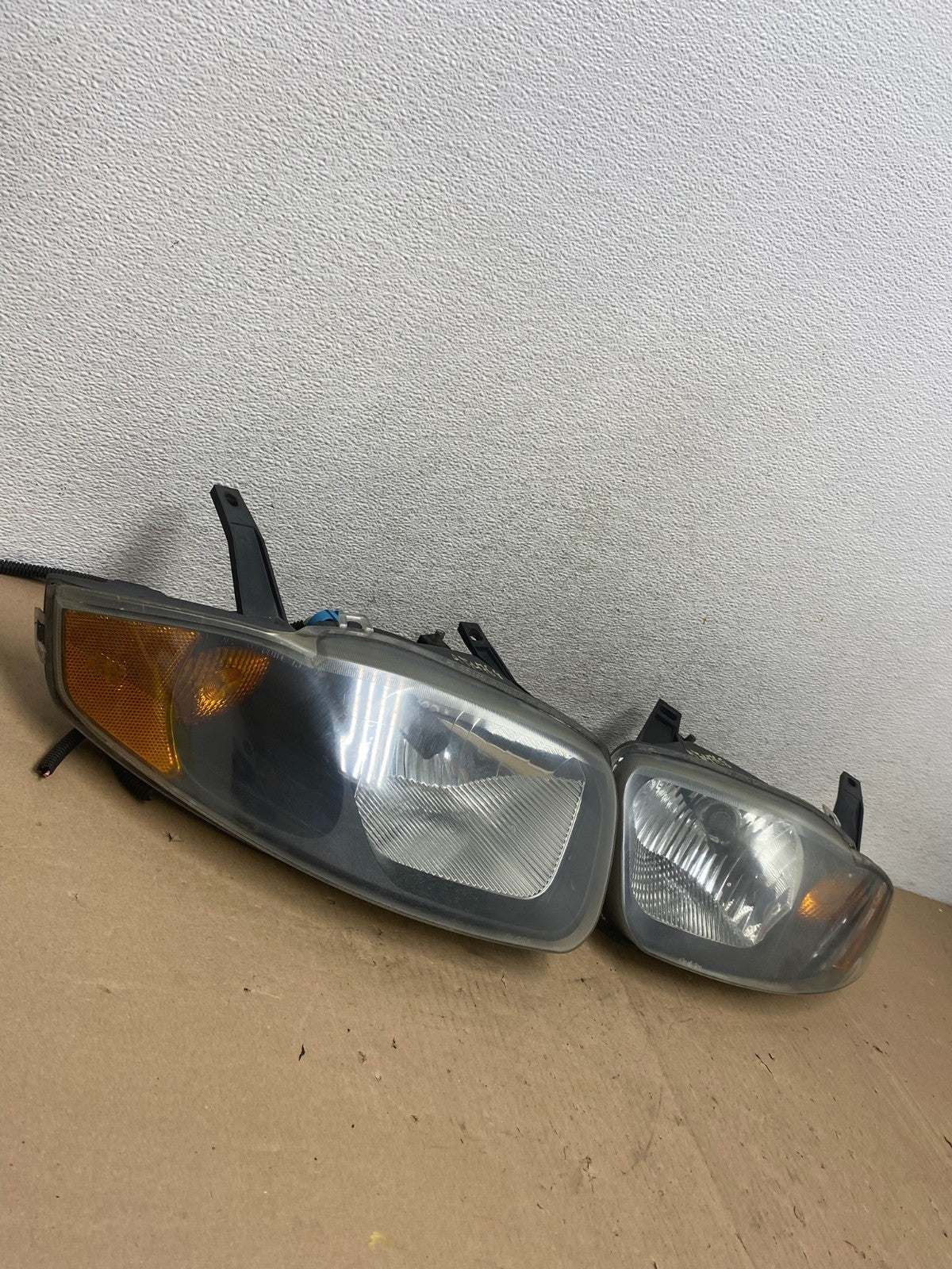 2003 - 2005 Chevrolet Cavalier Left+Right Side Black Set Headlights AG4768 DW1