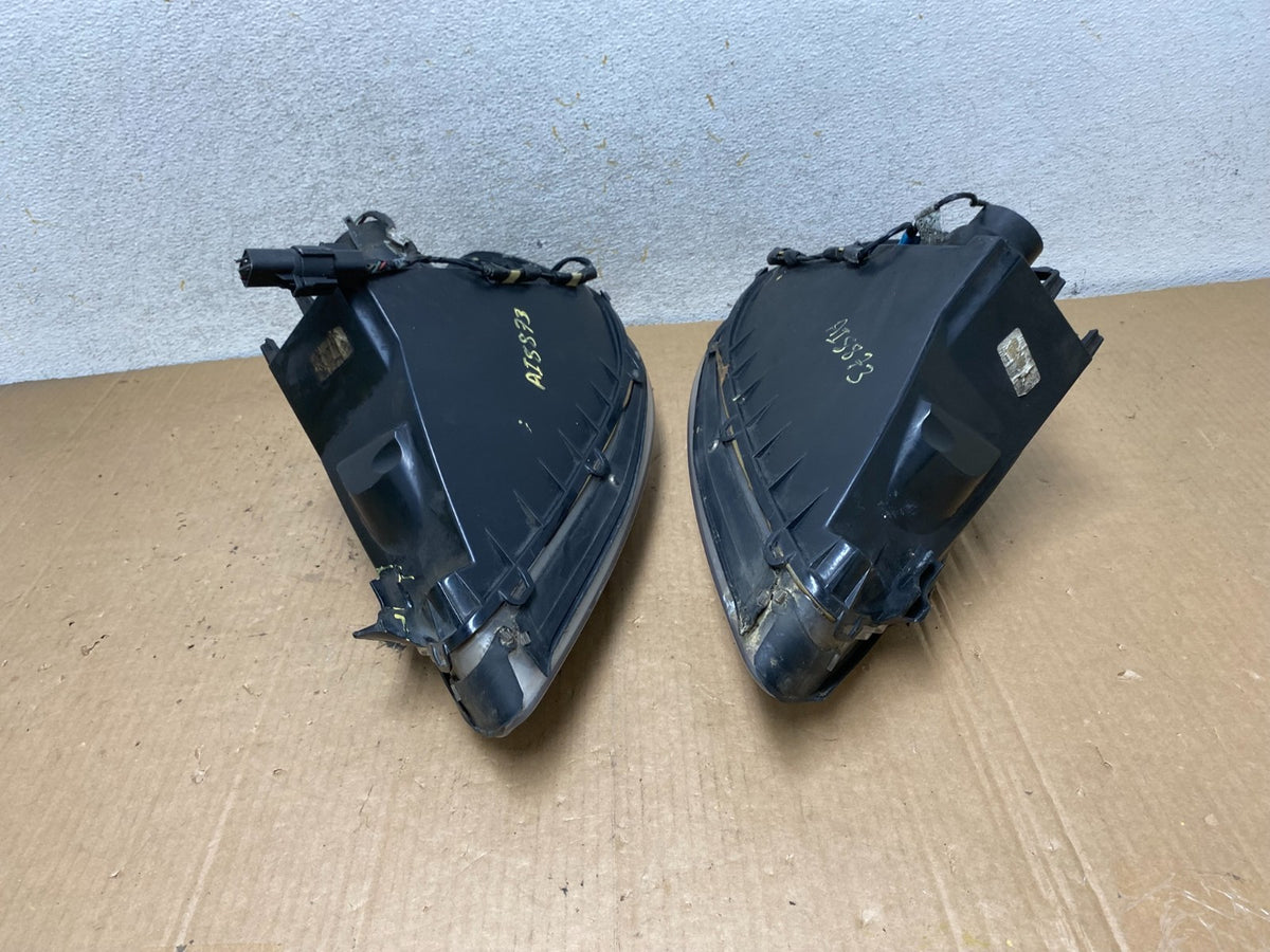 2000 to 2007 Ford Taurus Left+Right Side Halogen Headlights AI8873 DW16