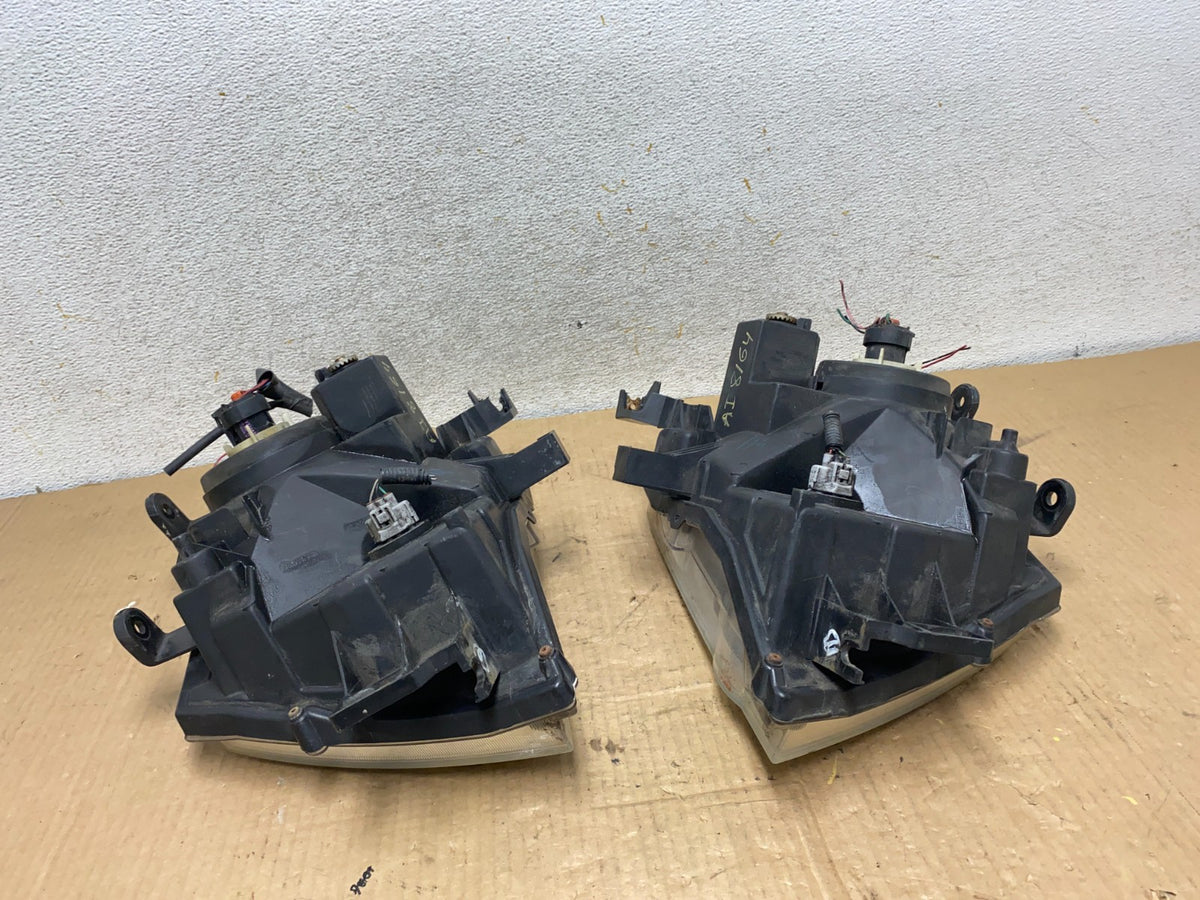 2005-2015 Nissan Xterra Driver Left+Right Side Set Headlights AI8164 DW8