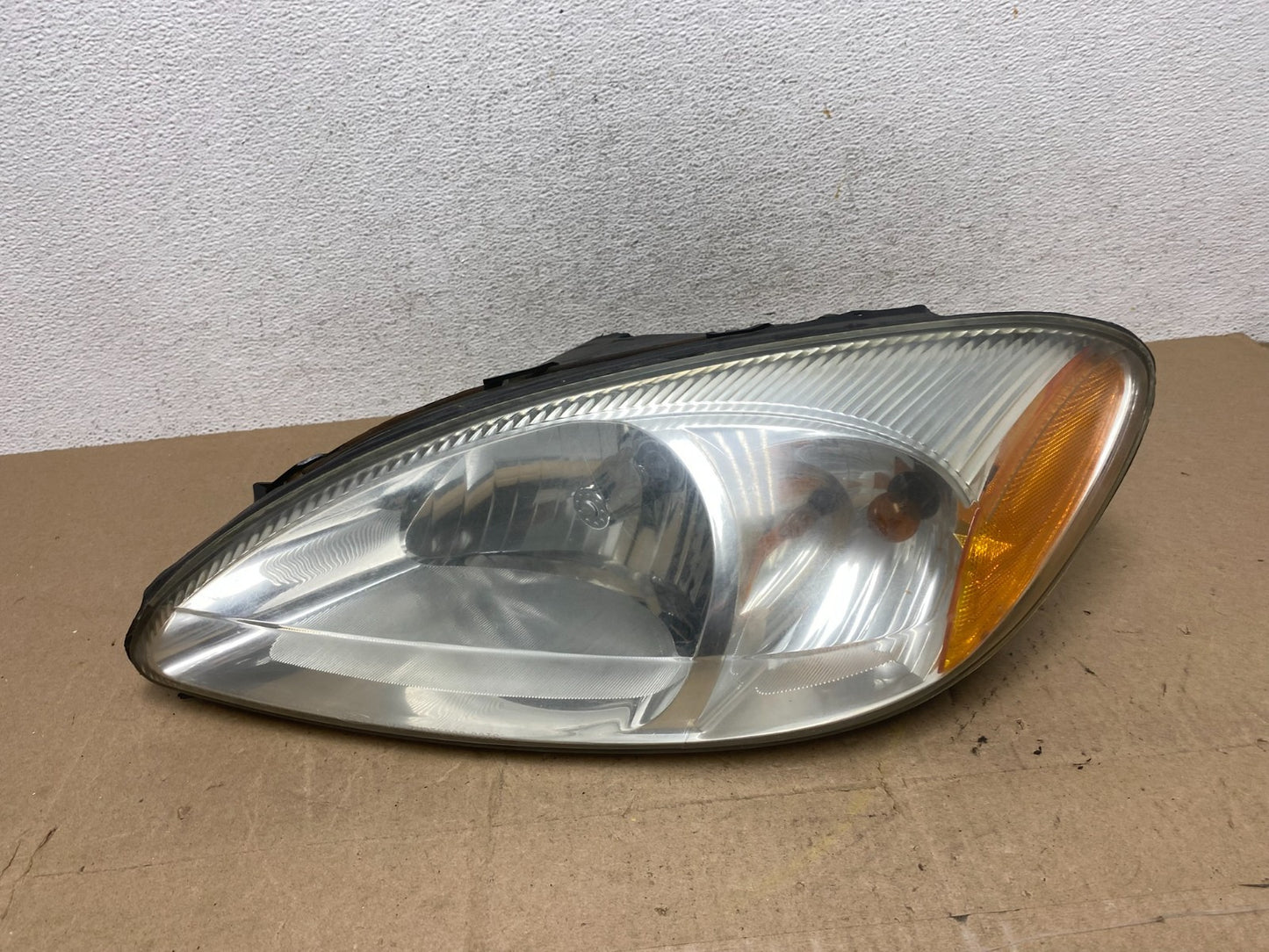 2000 to 2007 Ford Taurus Left Driver LH Side Halogen Headlight AE6794 DW0
