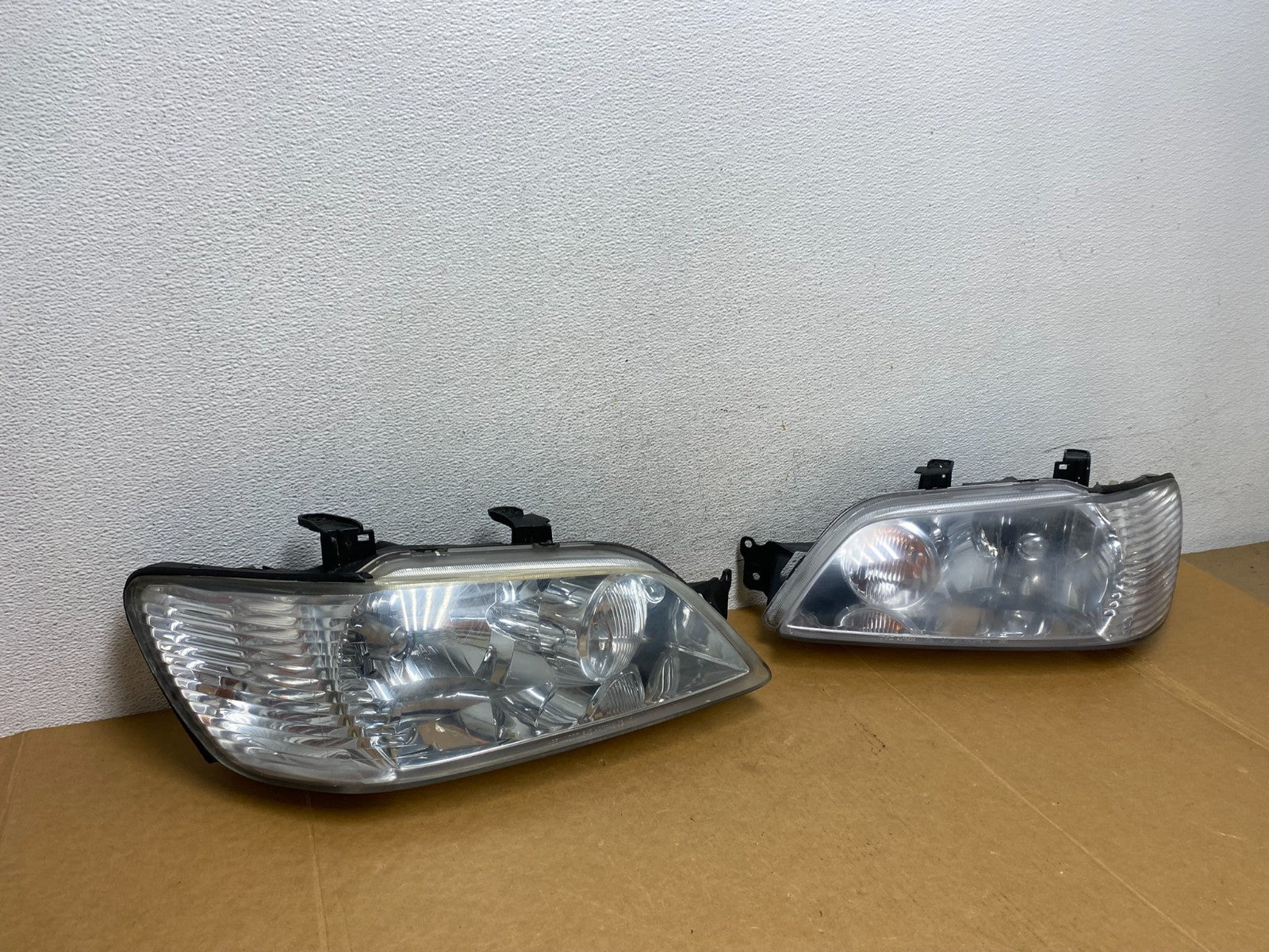 2002 - 2003 Mitsubishi Lancer Left+Right Side Headlights Halogen AD89392