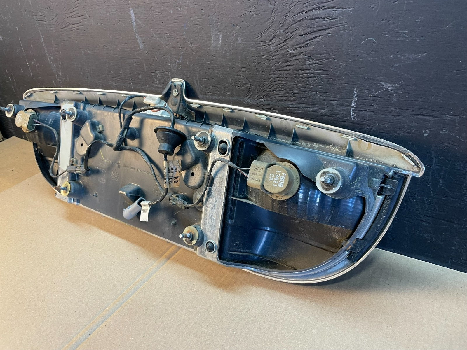 1999-2002 Lincoln Continental License Plate Panel Backup Lights Trim AB7915 DG7