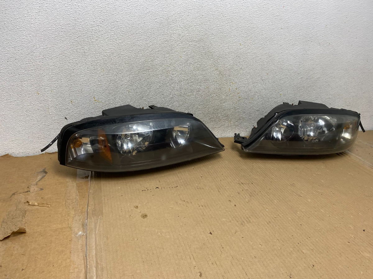 2003 to 2006 Lincoln Ls Left+Right Headlights Halogen AH3049 DW1