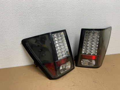 2005-2006 Jeep Grand Cherokee Left+Right Set Black LED Tail Lights AB6358 DG2