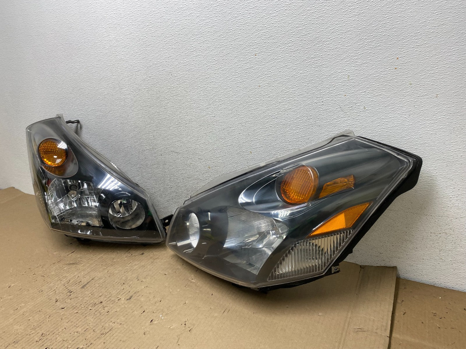 2004 to 2009 Nissan Quest Left+Right Side Black Headlights AE7101 DW1