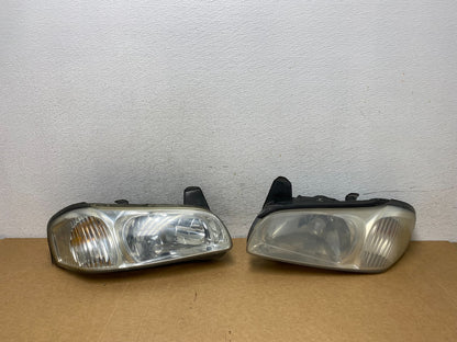 2000 to 2001 Nissan Maxima Left+Right Side Set Halogen Headlights AD5283 DW0